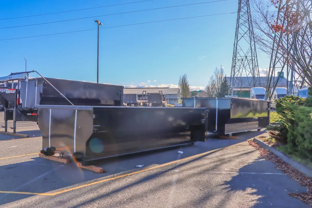 Roll-off dumpster ready for waste disposal at job site for 2 Yard Dumpster Rental in Hillsboro